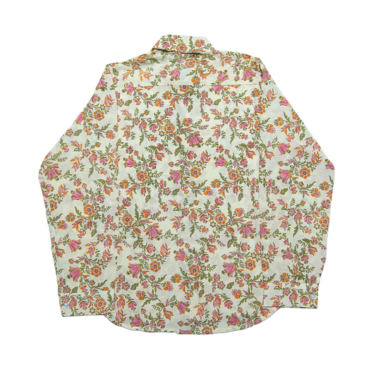 Unisex cream cotton shirt with vibrant floral print in pink, orange, and green, collared neckline, and long sleeves – Cotton Bloom.