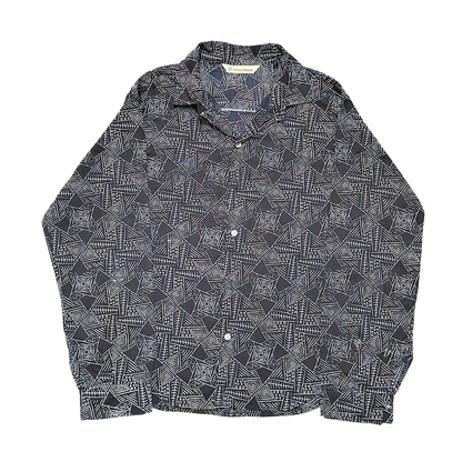 Black cotton shirt with white geometric line print, long sleeves, and buttoned cuffs – casual wear.
